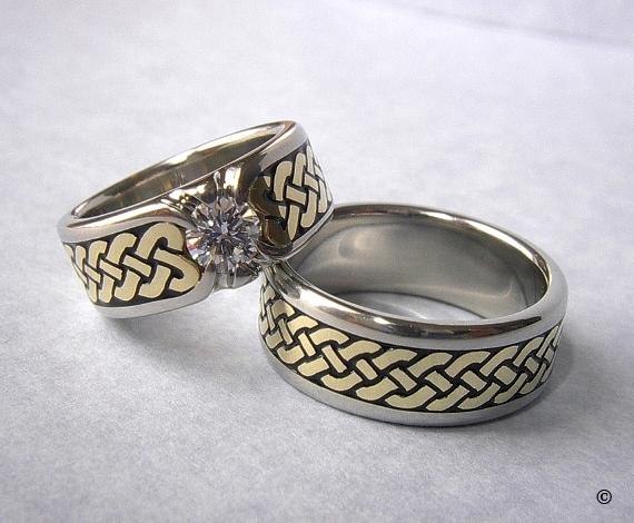 White and Yellow Gold Celtic Eternity Heart Shield Rings, with a flush set .50ct Diamond